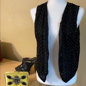 Vest with gold beads. Vintage
